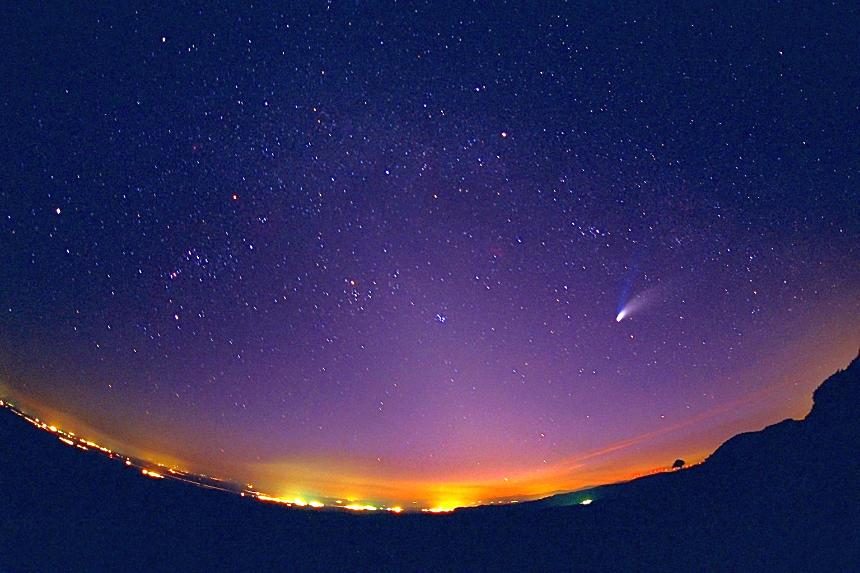 Starry sky with a comet